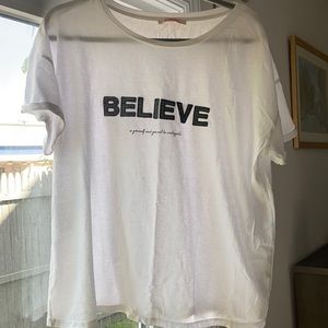 New xl white tee with the word believe . Bought in France not worn .